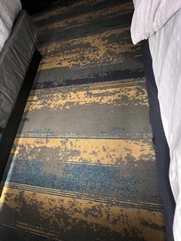 Creative carpet design camouflages the yuck