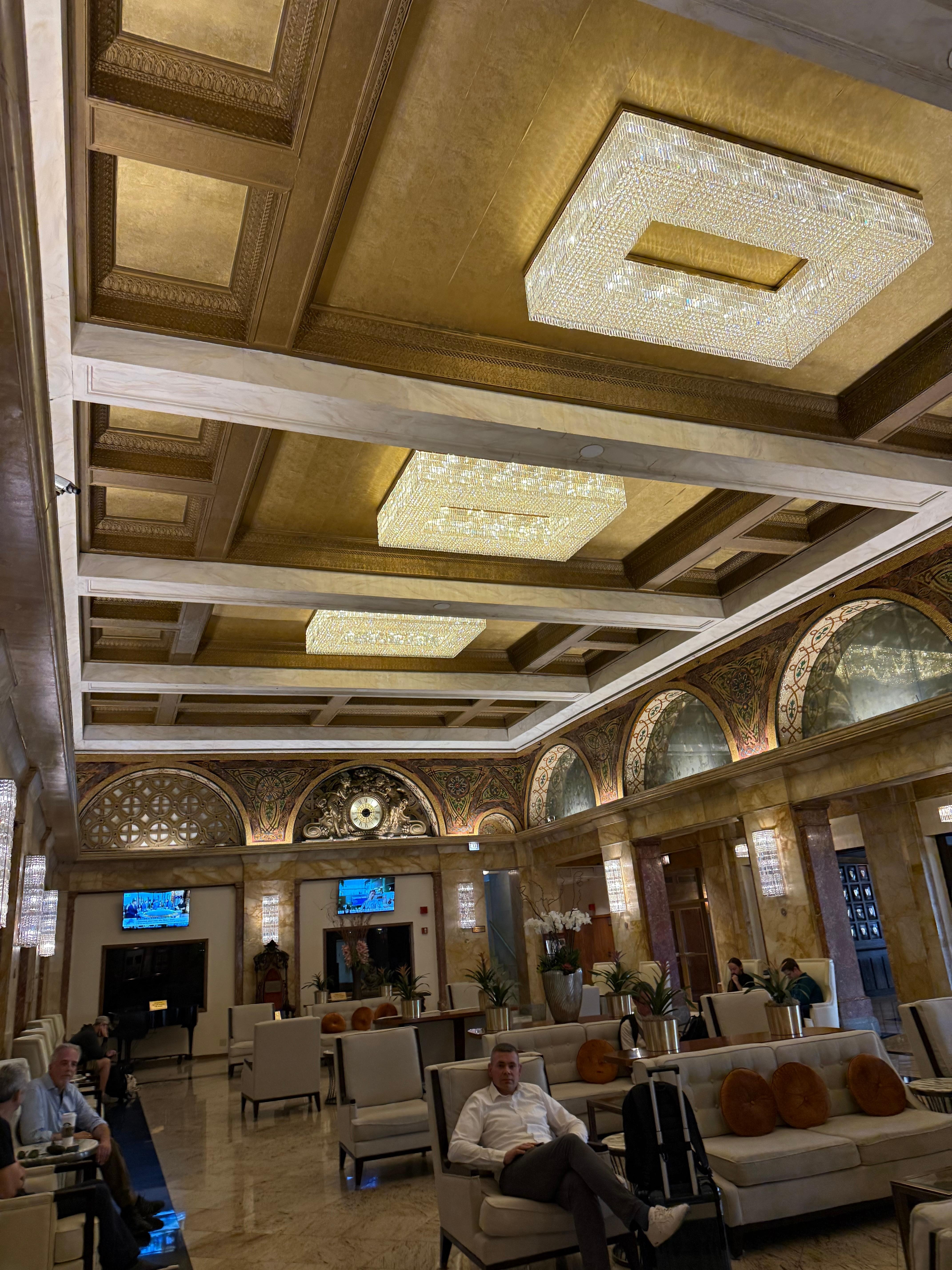 The lobby with its ornate ceiling 