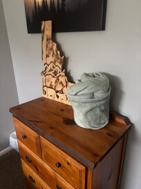 Cute sign and extra blankets for every room