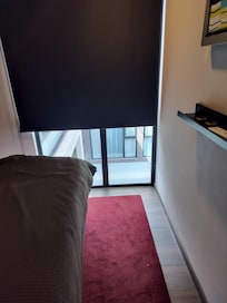 Master bedroom with no privacy, 6 other units look directly in.