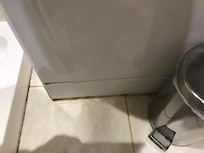 Scum behind door