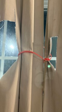 The curtains had been cut/damaged so light came in that was annoying.