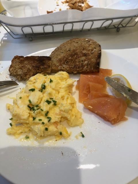 Breakfast, smoked salmon, scrambled egg and toast