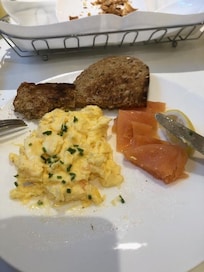 Breakfast, smoked salmon, scrambled egg and toast