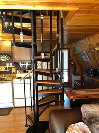 Staircase to bedroom from main floor