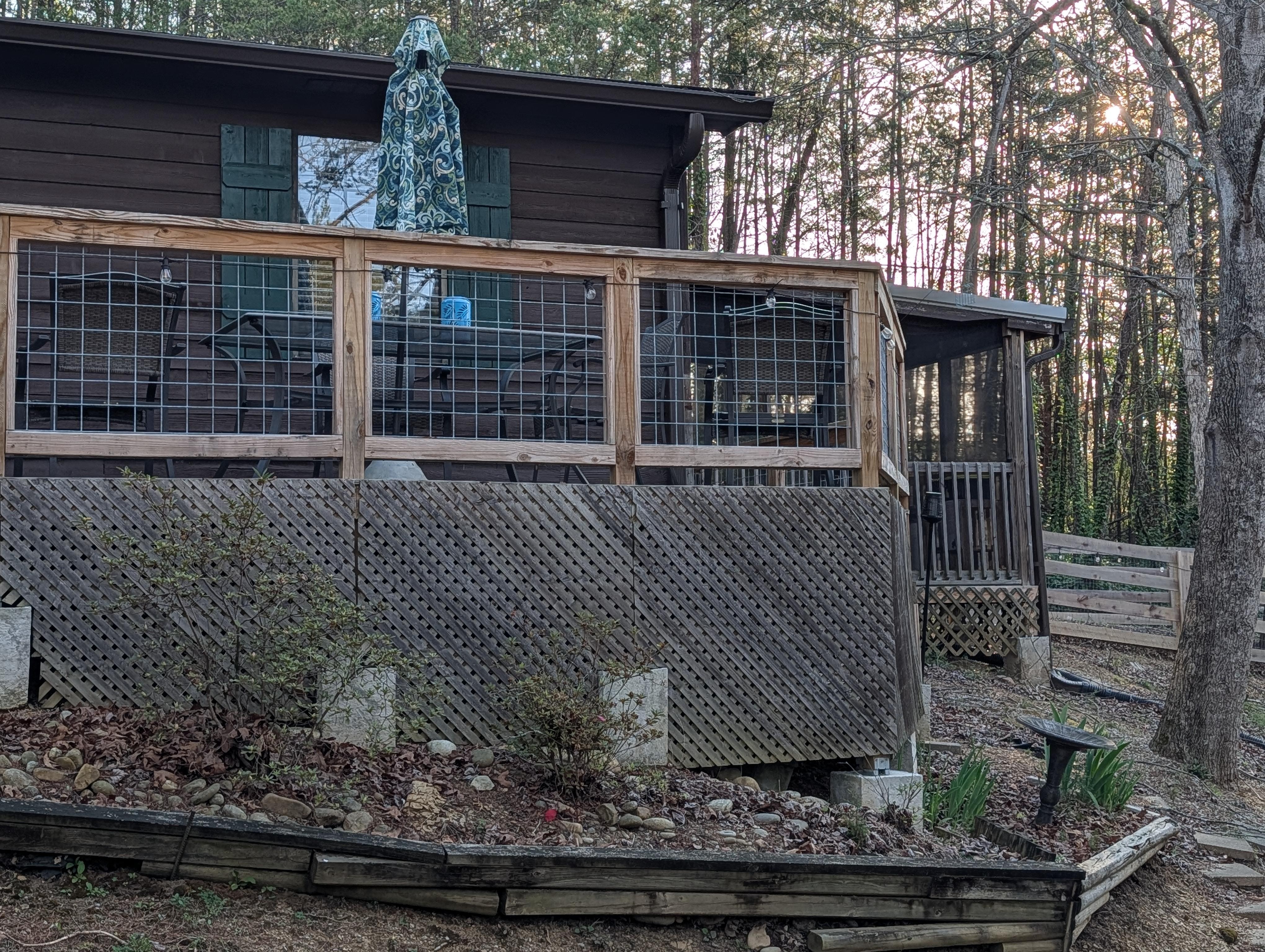 right half of cabin, showing where hot tub is off of master bedroom