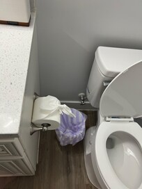 Decorative toilet paper in every bathroom you cant use; pre-dampened to the cardboard make the bow stick/set