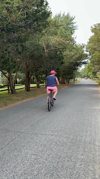 biking in front of house