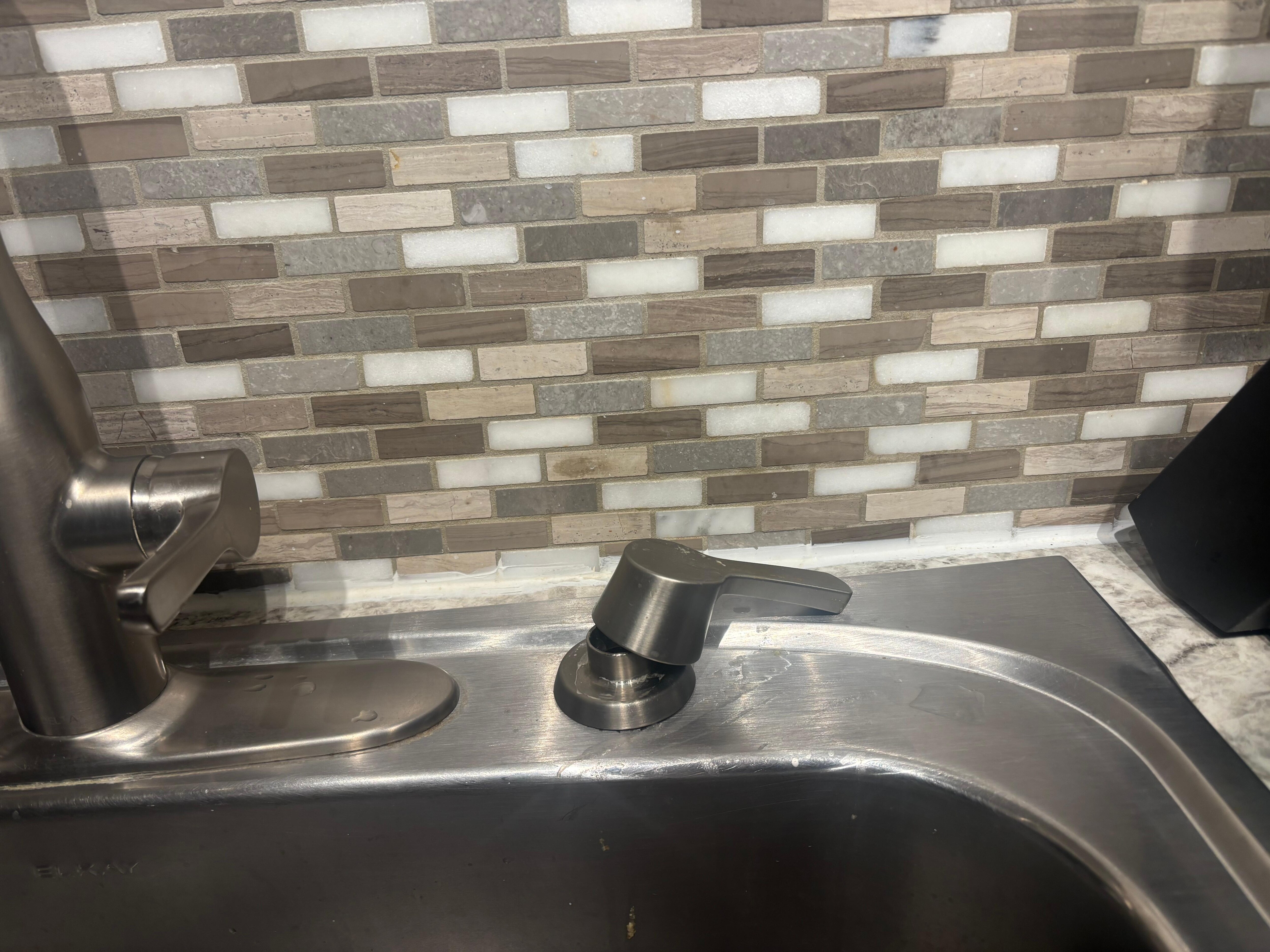 Kitchen sink hardware wasn’t even attached