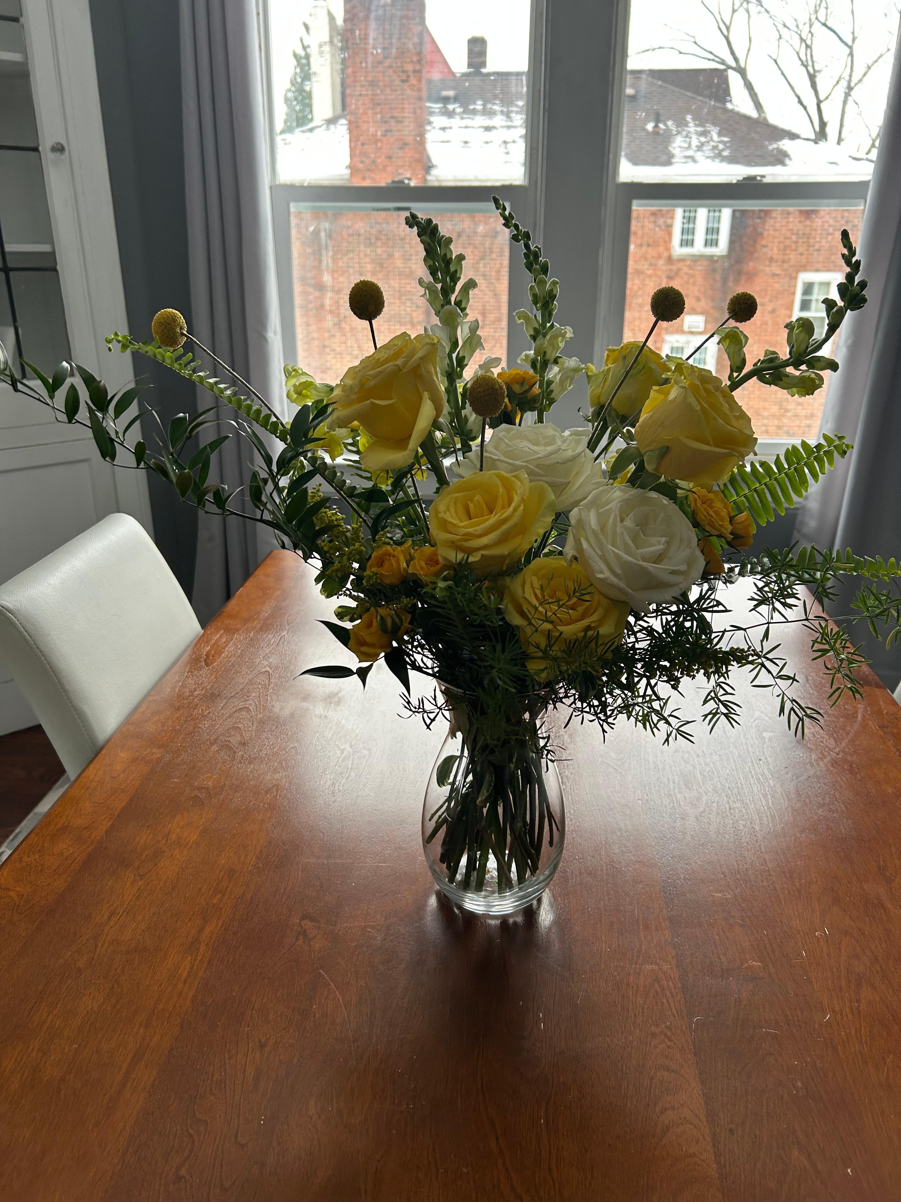 Our flowers in the sunny dining room 