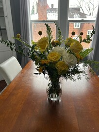 Our flowers in the sunny dining room