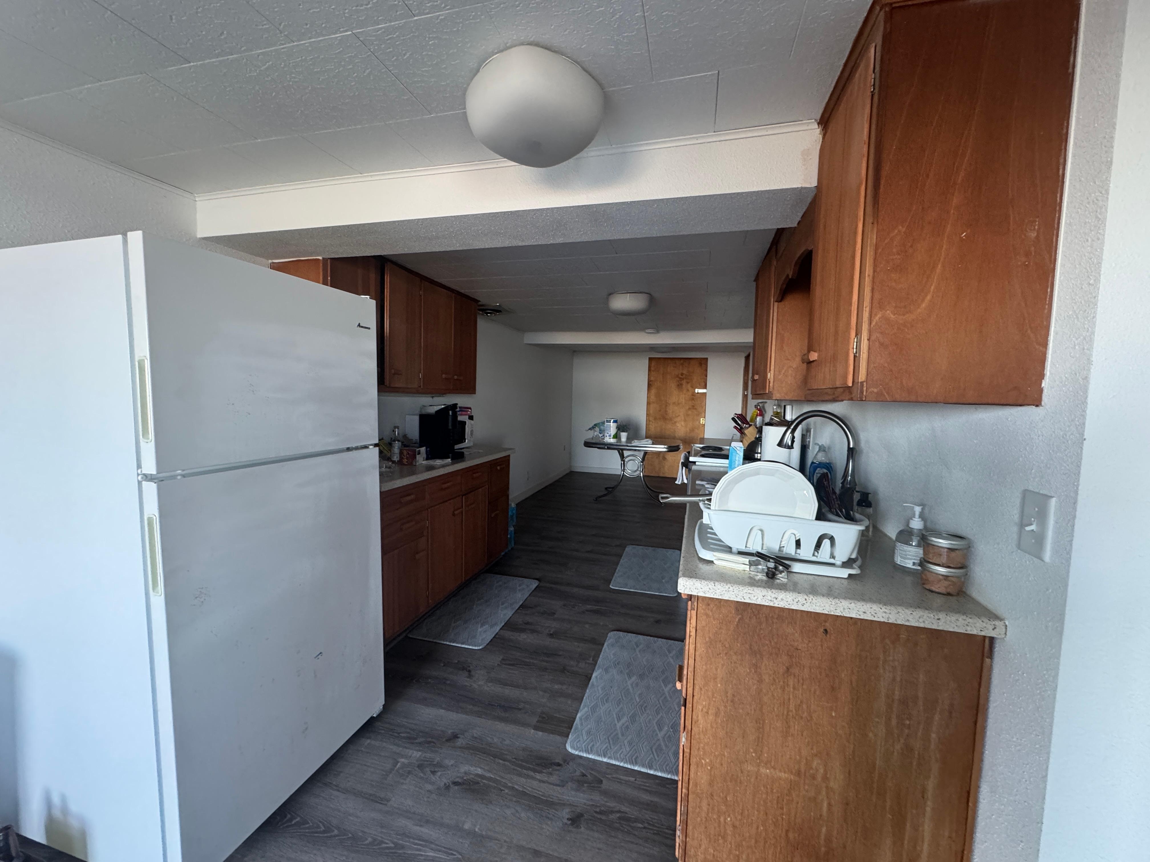 clean kitchen, pots, pans, cups , glasses, silverware , coffee pot etc. 