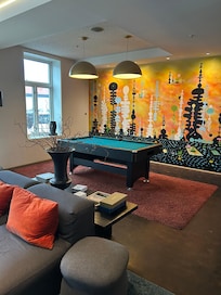 Welcoming Hotel Lobby with Pool Tablr