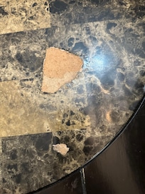 Peeling furniture throughout property.