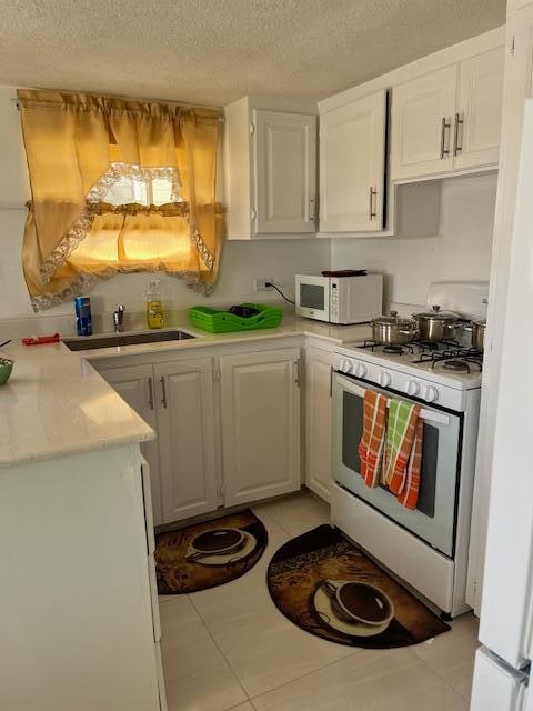 All one needs to make a meal in the well-stocked kitchen. 