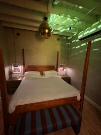 The disco ball above the bed is a nice touch