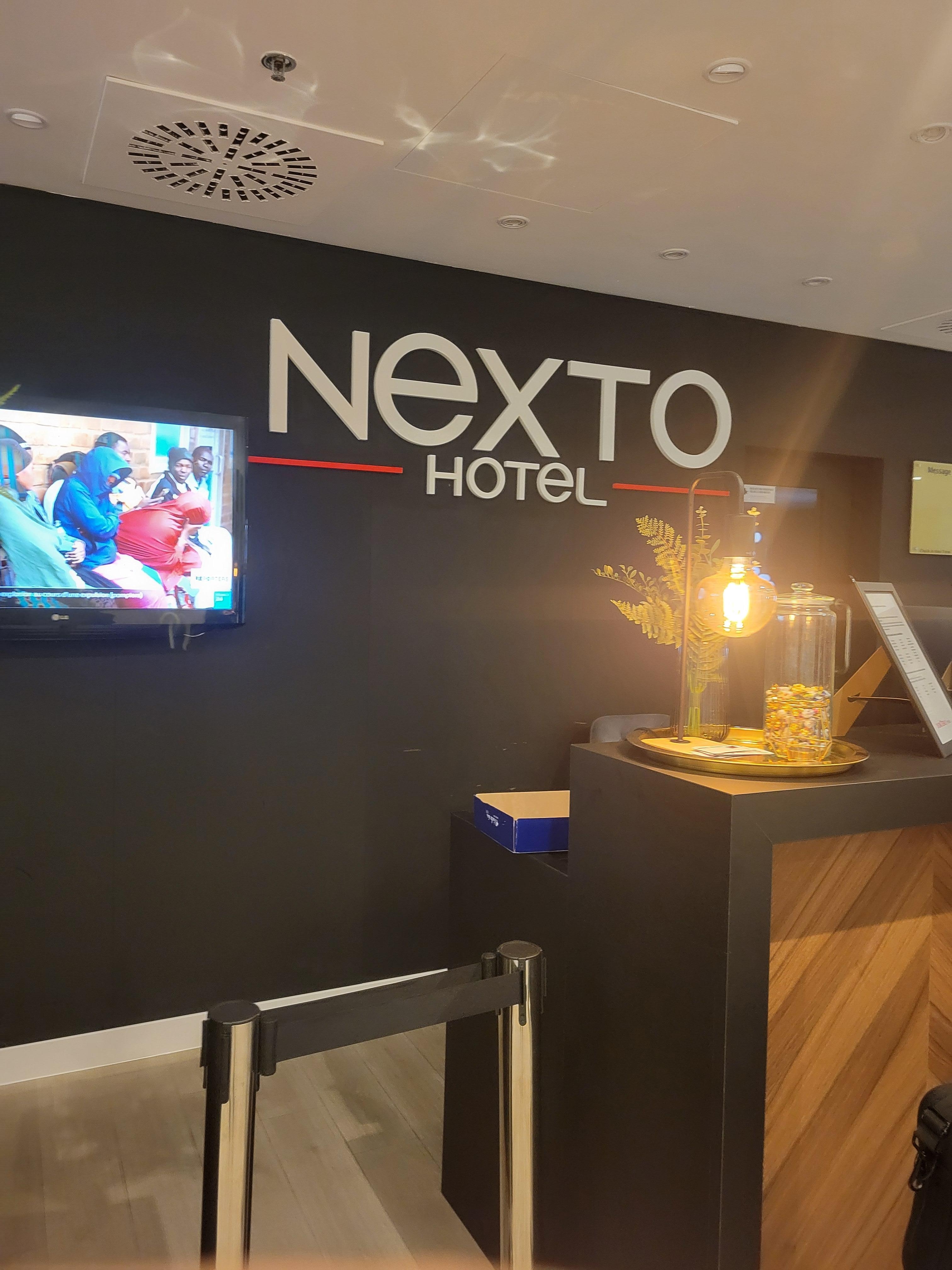 Hotel lobby with complimentary lemon water and regular water. for the guest a nice touch 