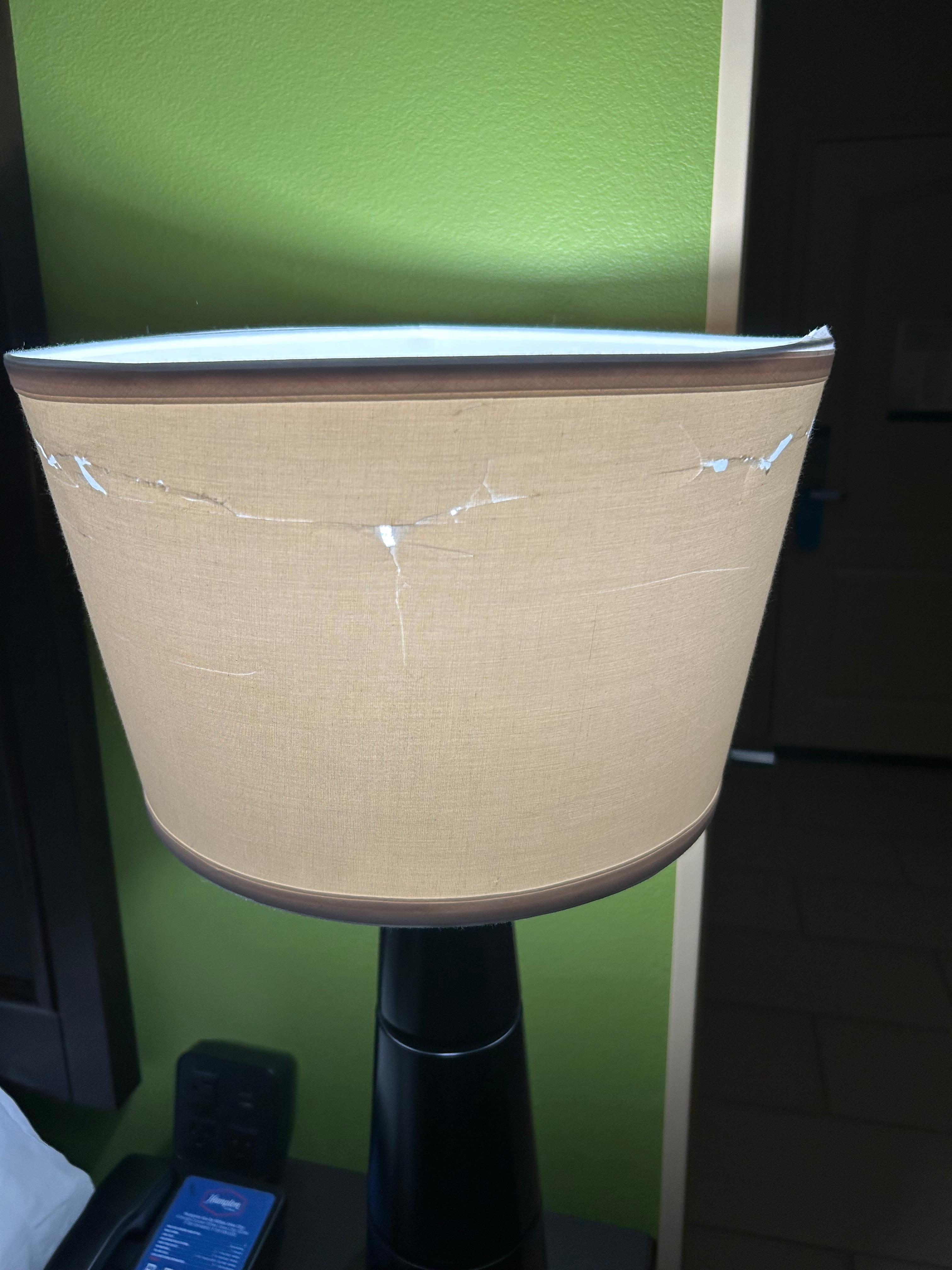 Incorrectly placed Ripped lampshade