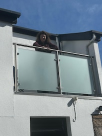 The small balcony on the 2nd floor. So cute.