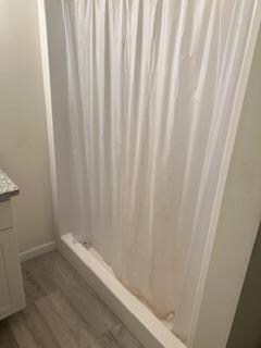 Dirty shower curtain.