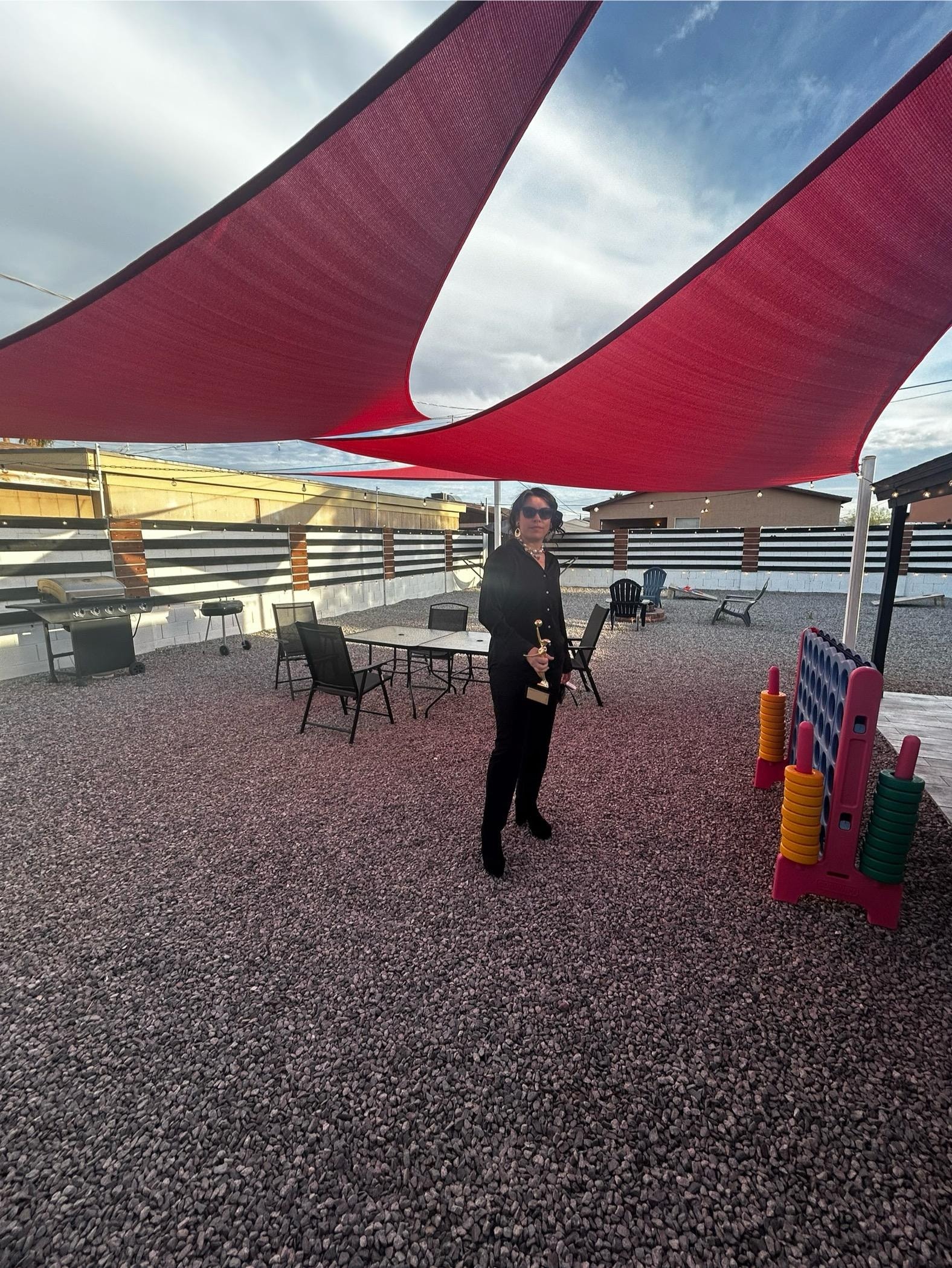 Cool backyard to just decompress and play some cornhole