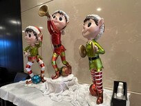 Joyful three elves statues at the lobby