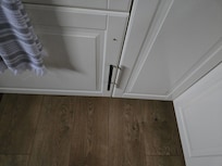 Handle on kitchen cabinet falling off.