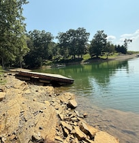 Dock pulled onto the shore - should have been released into the water more. Google Maps shows it in the water further. It has been pulled up and not released as the water drops.