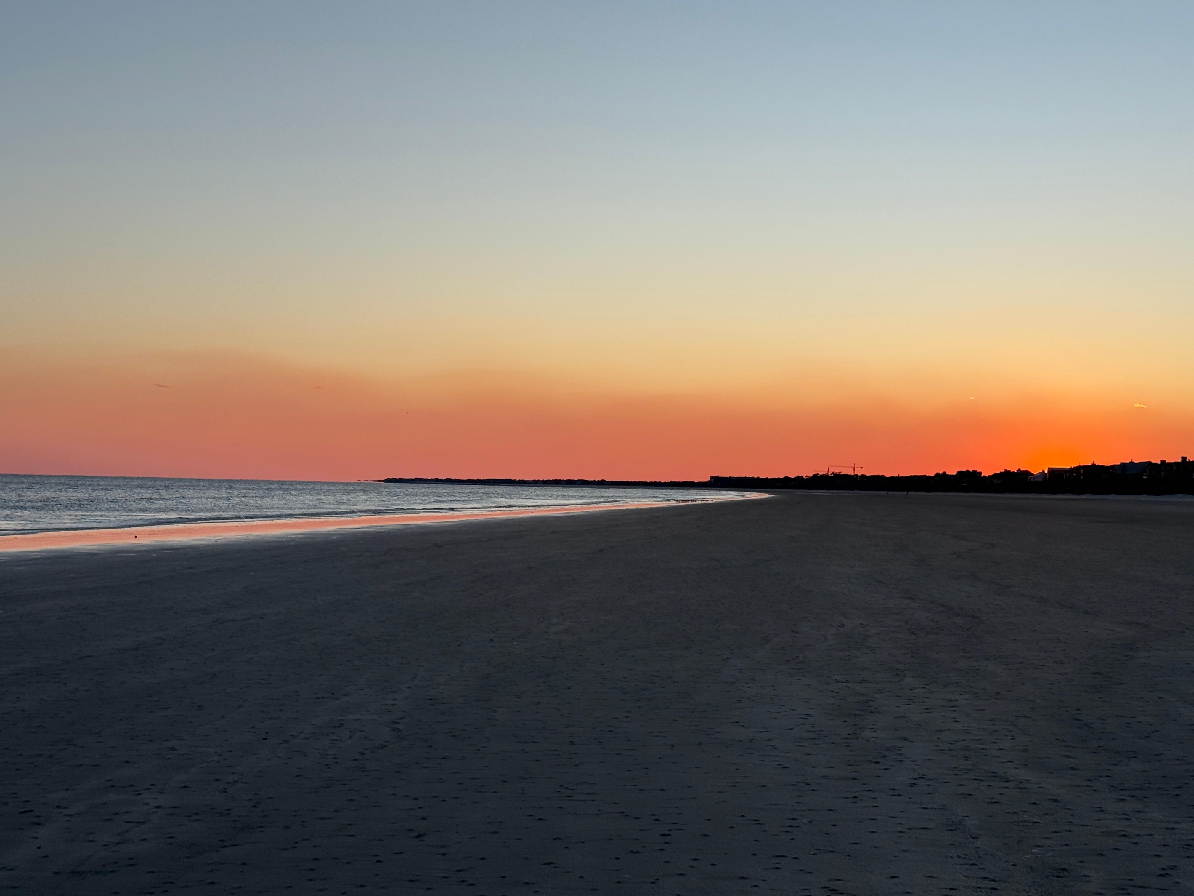 The beach at sunset.
