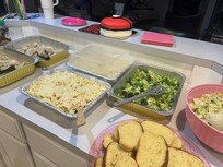 Ample space on kitchen Bar for food, made a buffet style for a group of people pleasant.