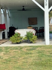 Bonus outside area with chairs, fans, wash of area