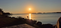 Sunset sitting on the picnic table