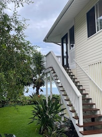 A part of the yard and the steps up