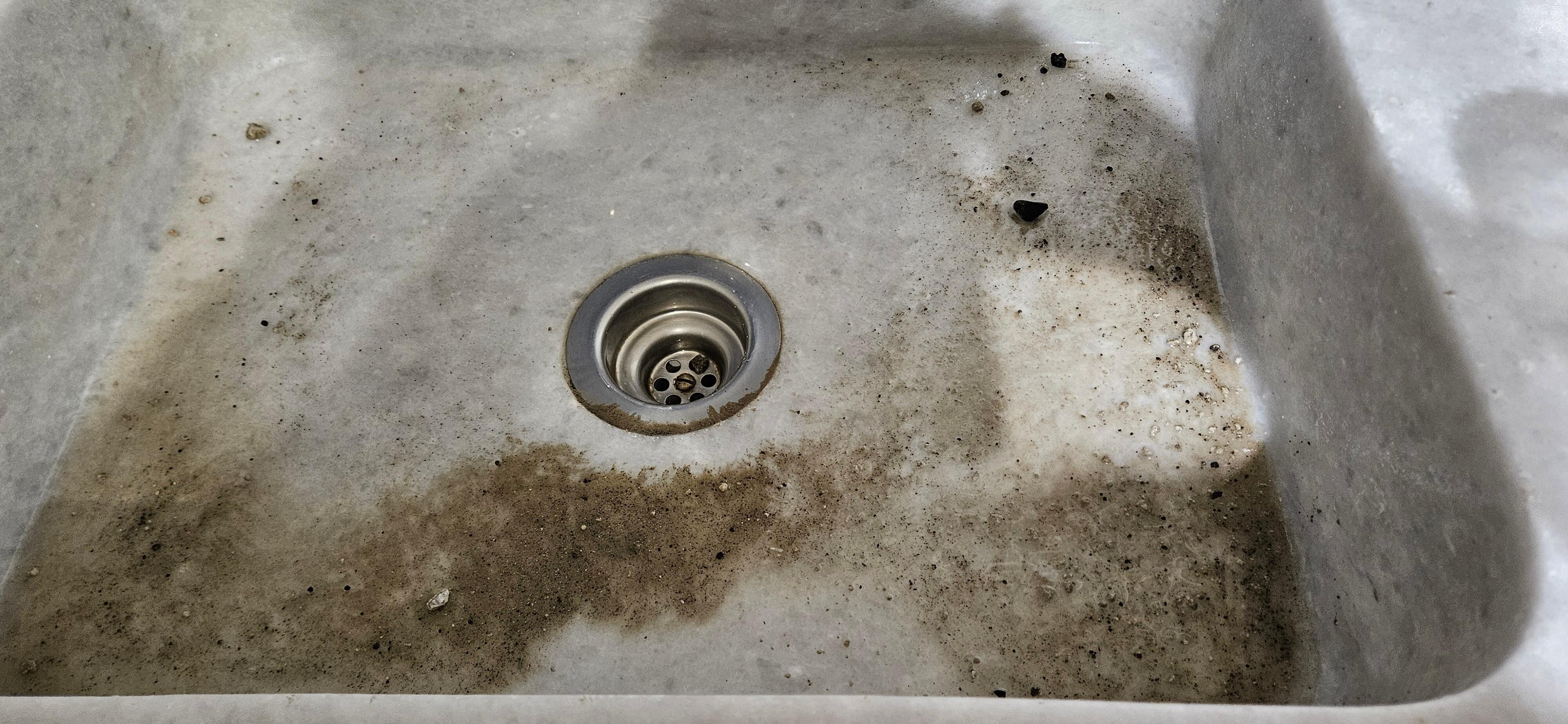 Rubble in sink from ceiling 