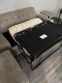 Pull-out sofa bed that supposedly could sleep two. Only if they are small children.