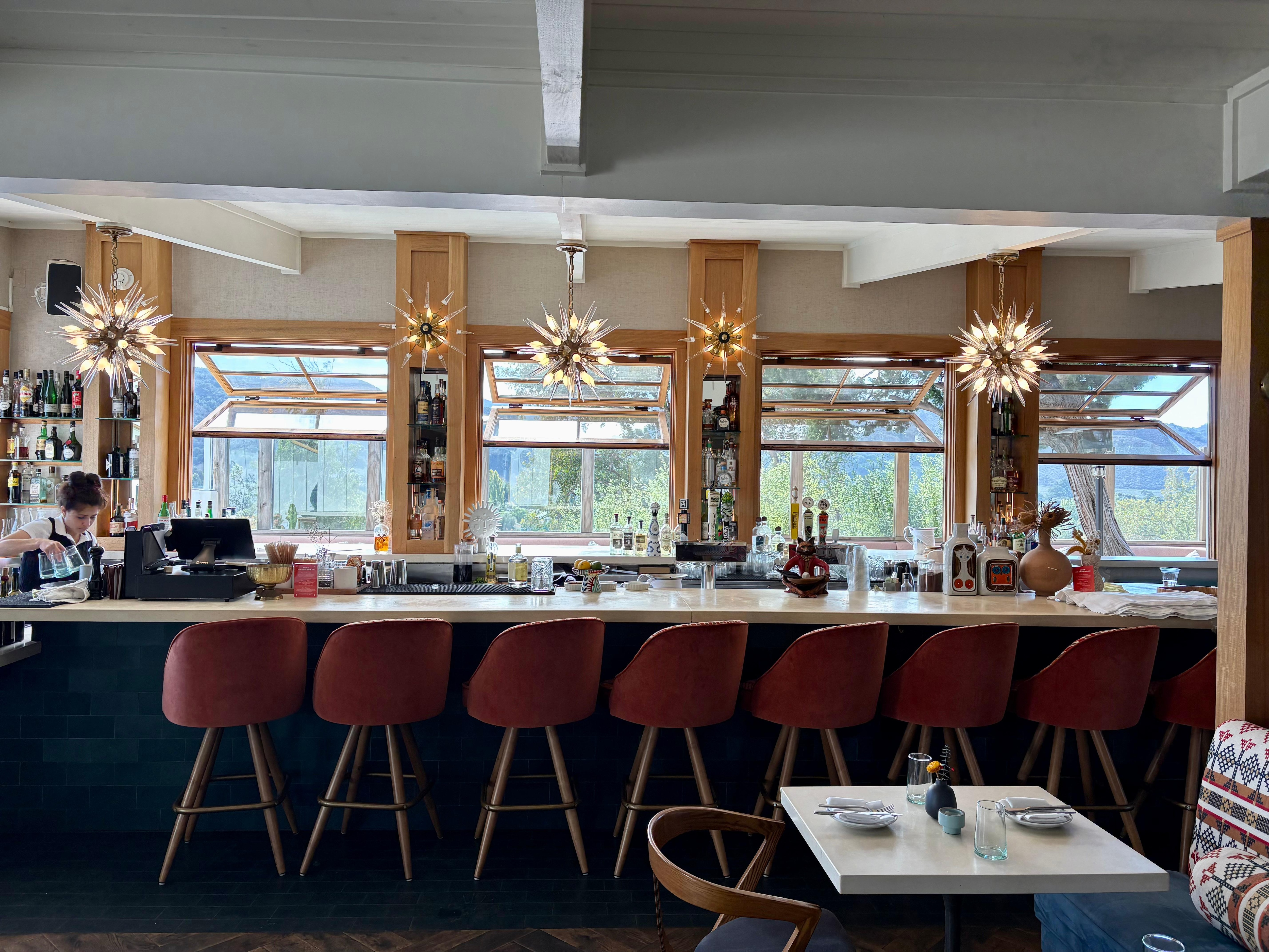 Bar inside of Norman Restaurant. The bartender was very entertaining and she made cocktails with flair! 