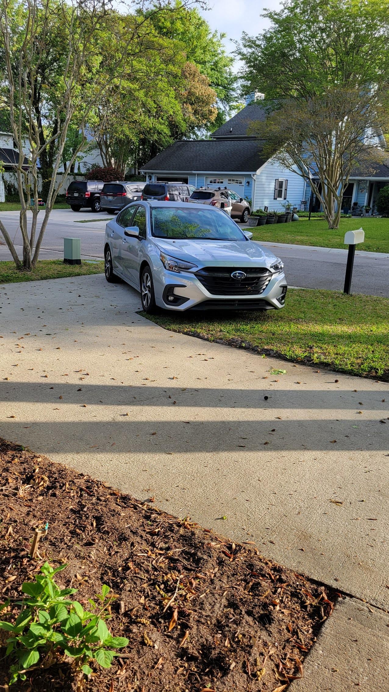 The driveway has a drop-off so I needed to pull in at an angle to avoid scrapping my bumper on the concrete.