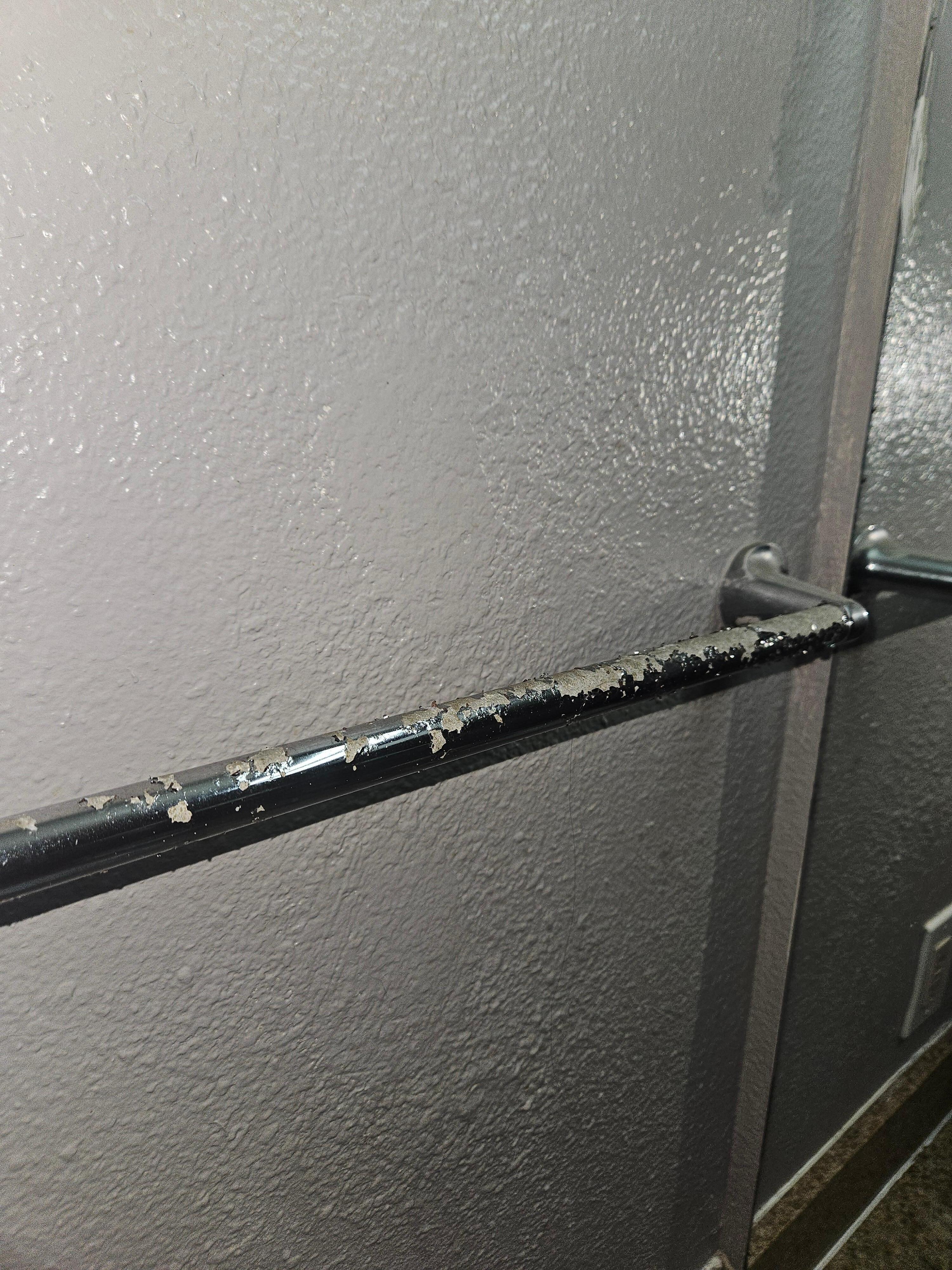 chrome pealing off the towel rod, obviously not even wiped down i  some time