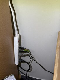 Power bar just hanging with multiple things plugged in