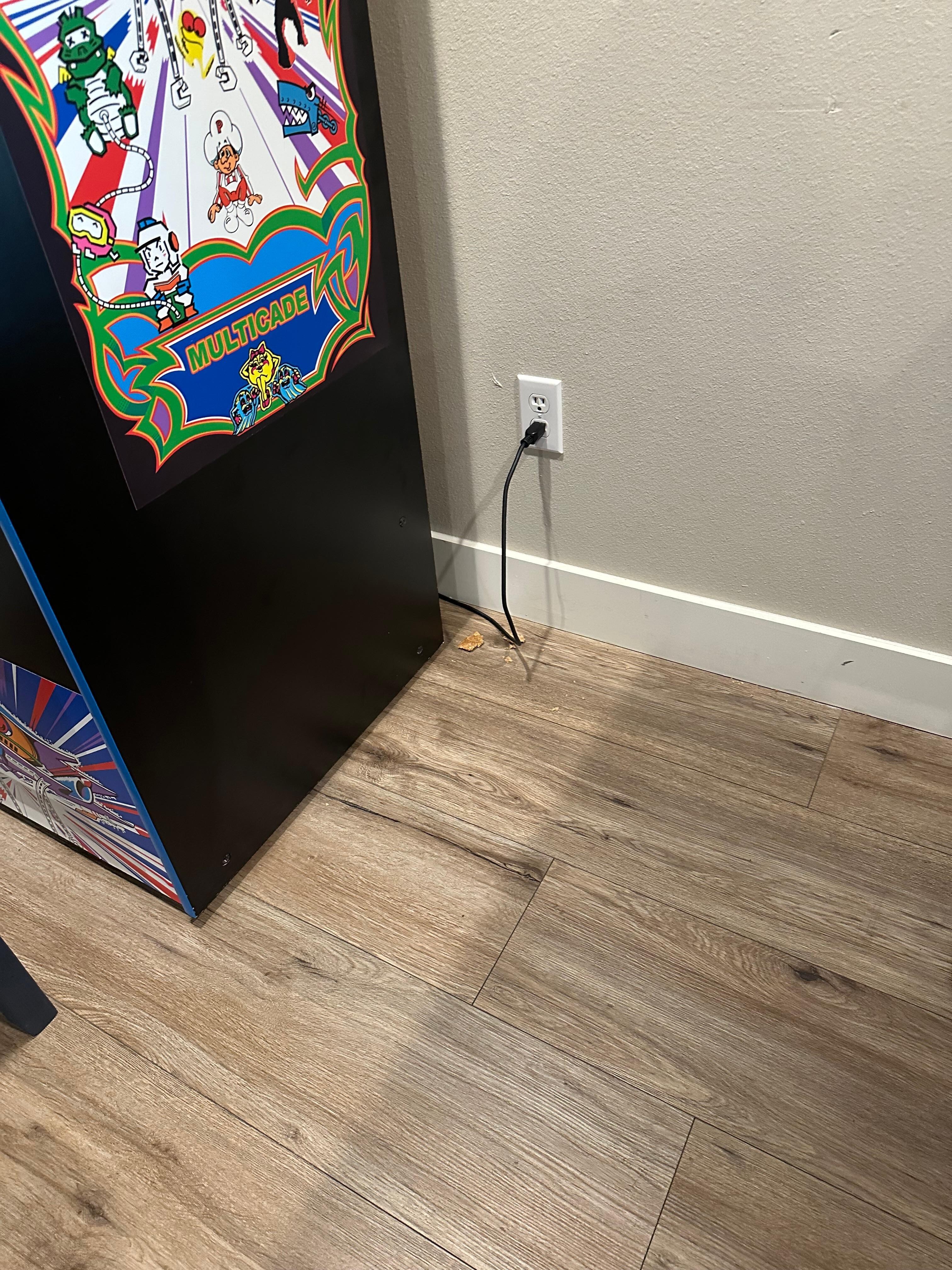 Full cookie by video game there were also crackers by the table and the floors do not seem to be properly mopped felt crud on our feet