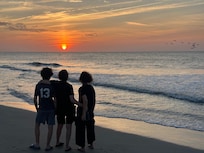 "Just steps away," as they say, from Tide the Knot. We endorse the sunrise too.