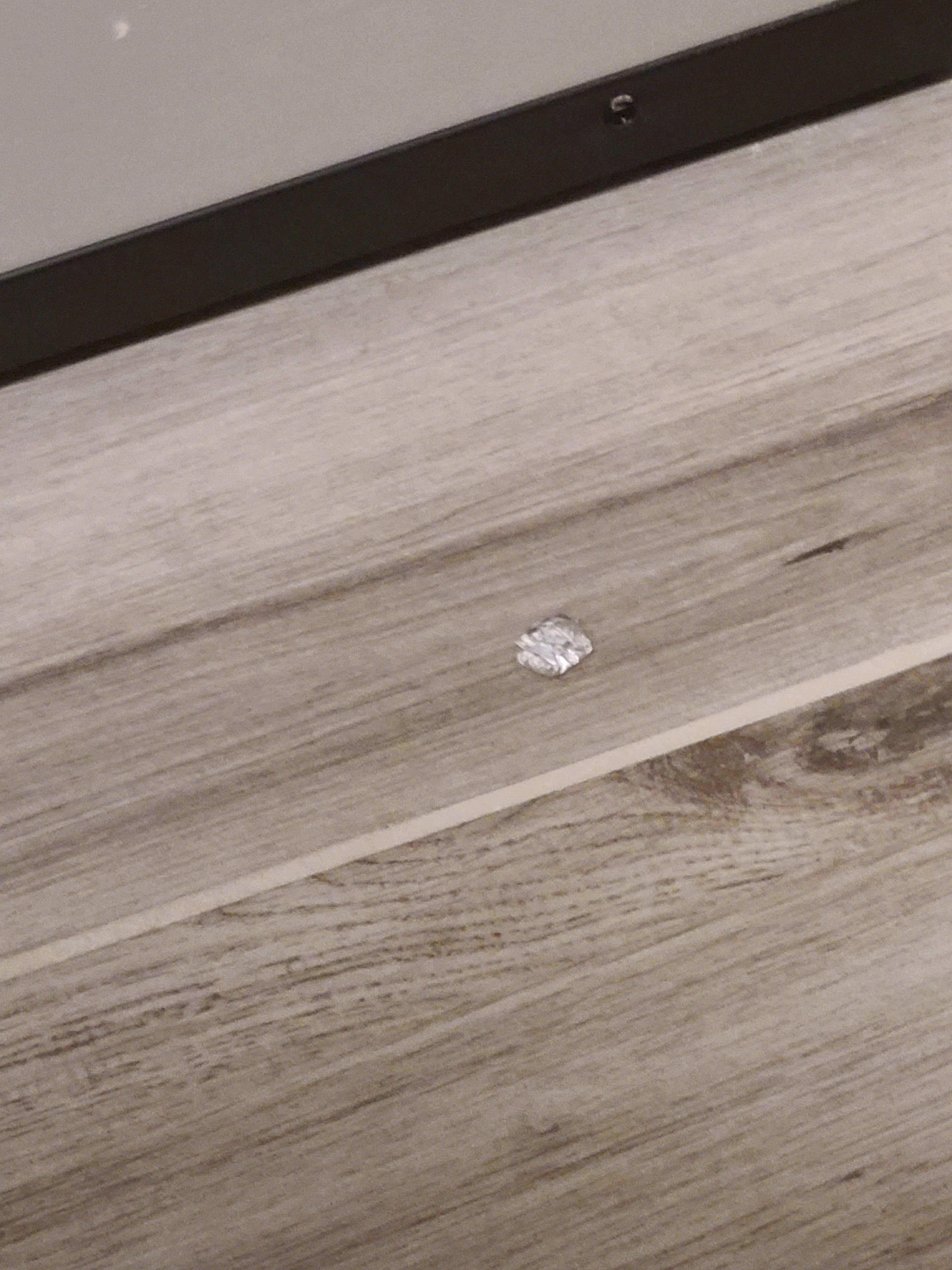 Gum wrapper on floor