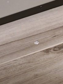 Gum wrapper on floor