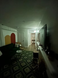 There is an emergency exit light in the living room that cannot be turned off.