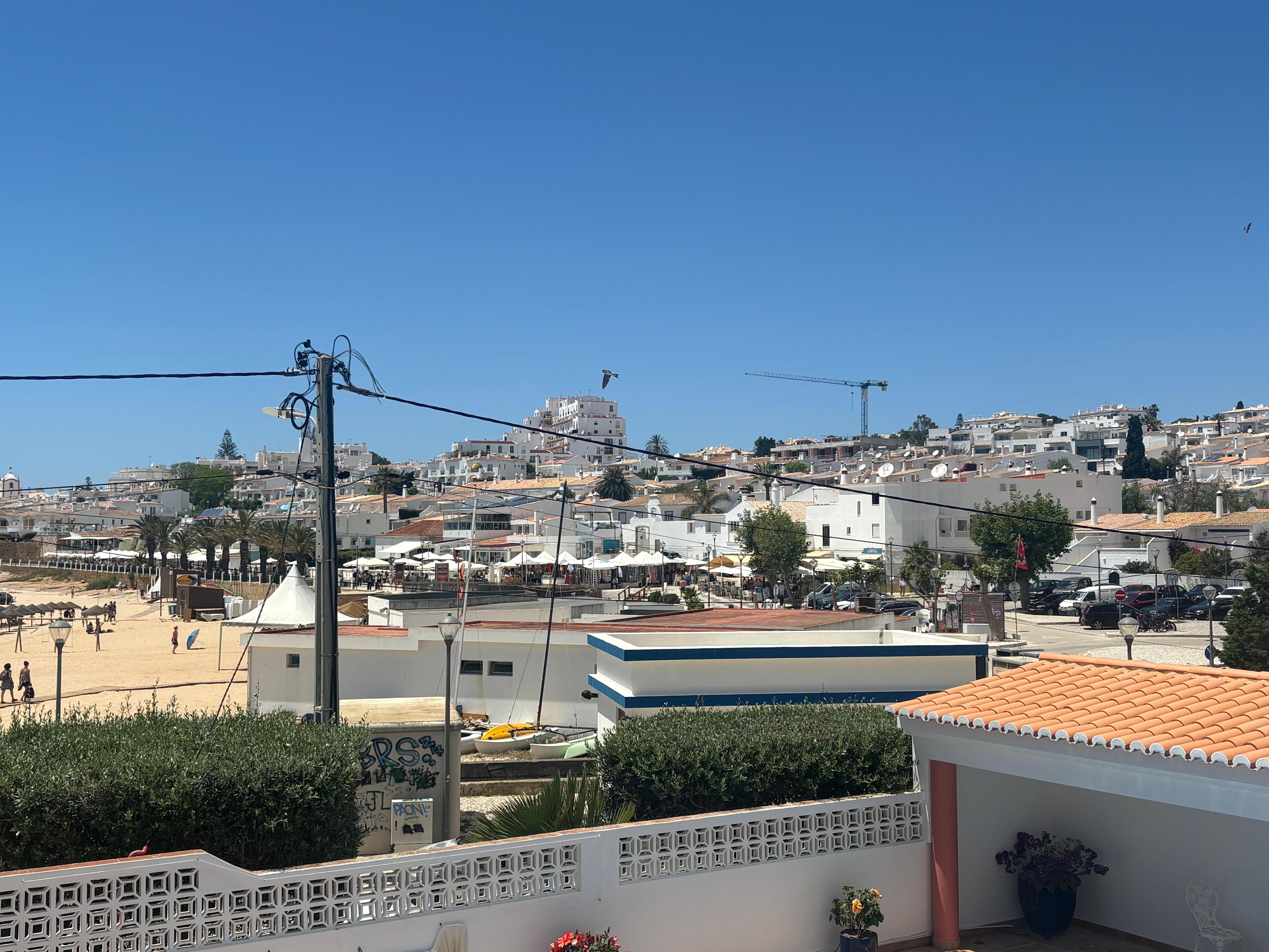 View from the covered patio of the area with restaurants