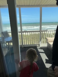 Beautiful balcony view of the beach and the pool directly below