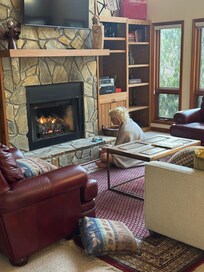 Cold teenager warming up by the fire!