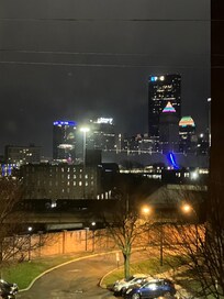 View of the city at night out our window.