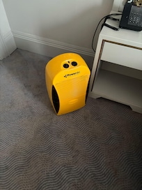 large dehumidifier had clearly been running a long time as smelled of burnt dust. Carper still very wet!