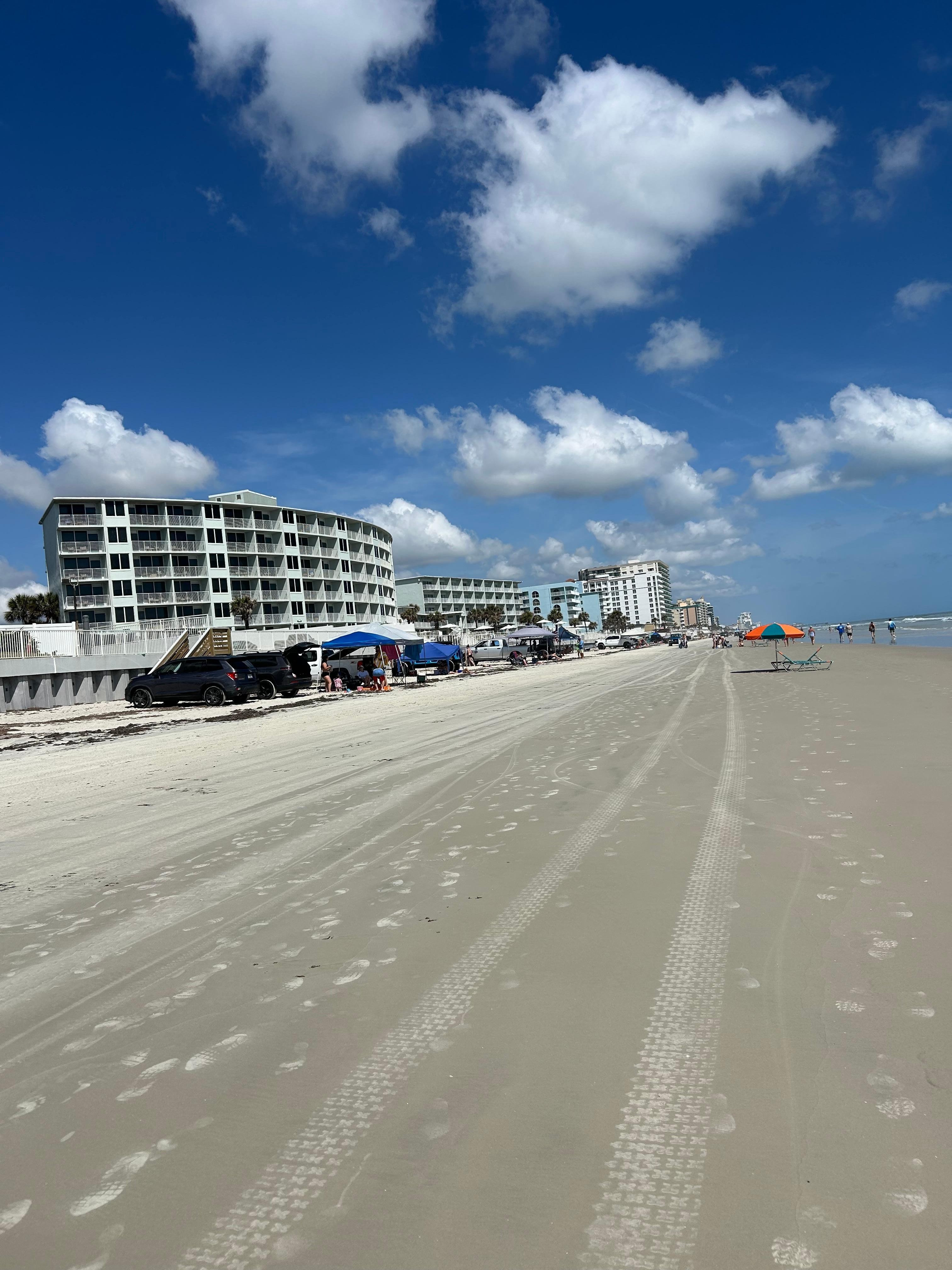 Beach outside hotel facilities, ocean immediately to right but not included in photo